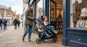 A narrow best double pushchair fitting easily through a standard high street shop doorway.