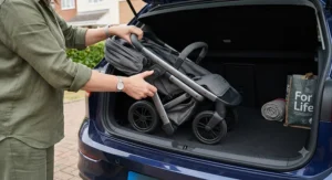 Close up showing how quickly the best travel buggy folds for easy storage in a car boot.