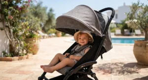 A best travel buggy with the sun canopy fully extended to protect a child on holiday.