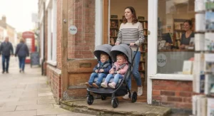 Demonstration of a slimline side by side double buggy fitting easily through a standard shop entrance