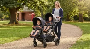 A versatile double pram with adjustable seat units configured for growing twins.