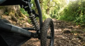 Close-up of the robust suspension system on the best running buggy, built for smooth rides on British country paths.