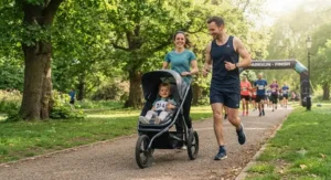 Family enjoying a weekend park run with their toddler safely secured in the best running buggy.
