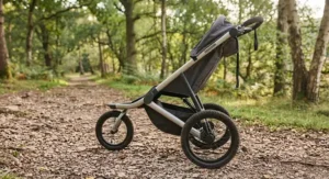 Lightweight off road jogging stroller showcasing its shock-absorbing frame on a gravel path