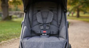 The comfortable padded seat and secure 5-point harness inside the lightweight jogging pushchair.
