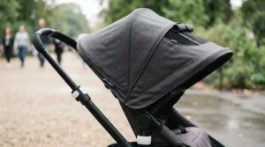 Extended sun canopy on a pushchair suitable from birth to 4 years protecting a sleeping child